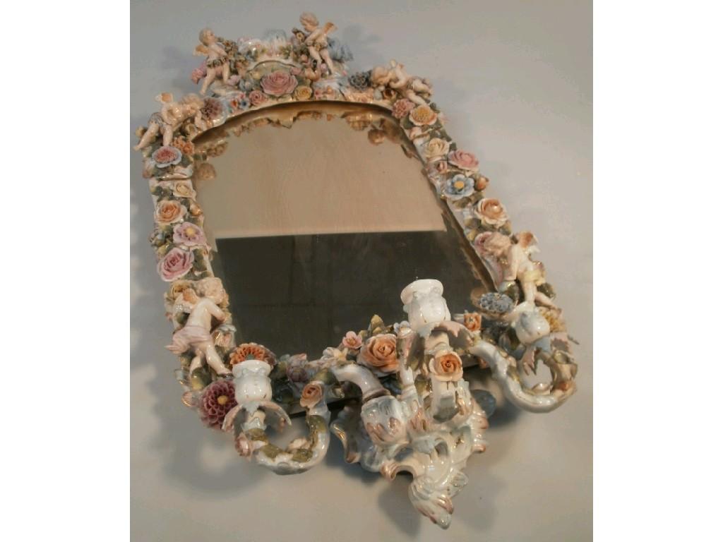 Appraisal: A late thC continental porcelain mirror decorated with flower heads