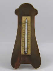 Appraisal: A silver cased strut back desk thermometer London Ht cm