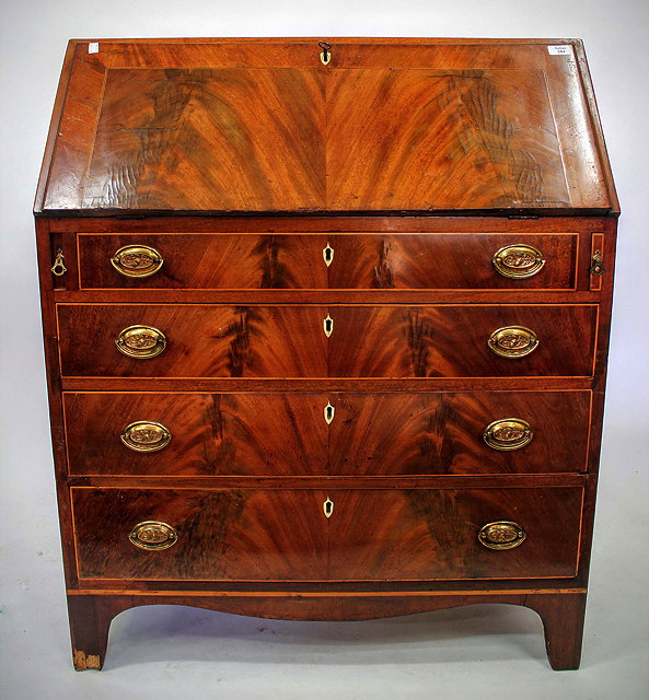 Appraisal: A VICTORIAN MAHOGANY BUREAU the fall front opening to reveal