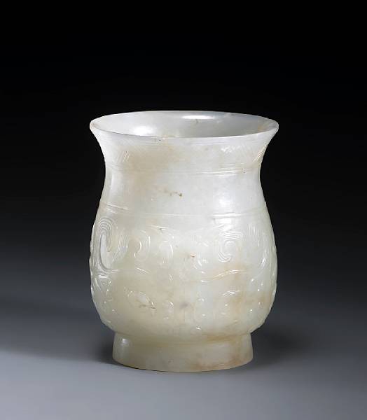 Appraisal: A white jade archaistic vase th Century Of ovoid section