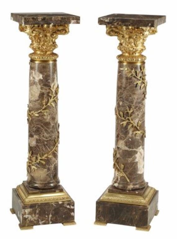 Appraisal: ORMOLU-MOUNTED MARBLE PEDESTALS pair Marble pedestals with bronze dore mounts