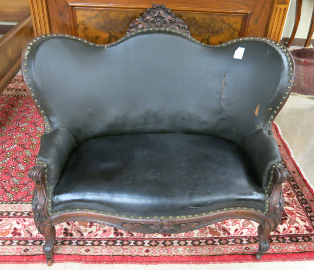 Appraisal: VICTORIAN CHILD-SIZE SETTEE American th century having a carved and