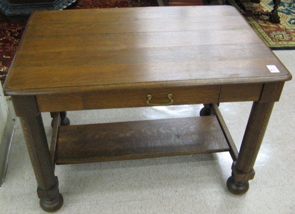 Appraisal: AN OAK EMPIRE REVIVAL LIBRARY TABLE American c having a