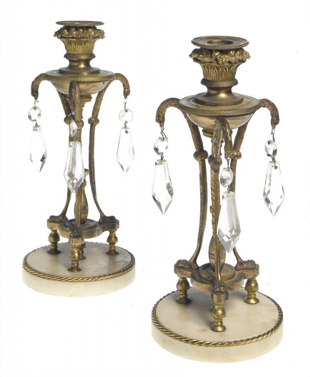 Appraisal: A PAIR OF FRENCH GILT BRONZE CANDLESTICKS the nozzle in