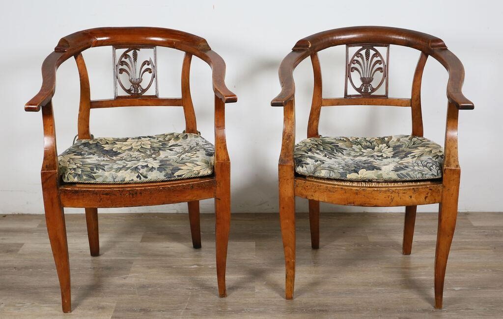 Appraisal: Pair of French Provincial rush seat arm chairs Carved floral