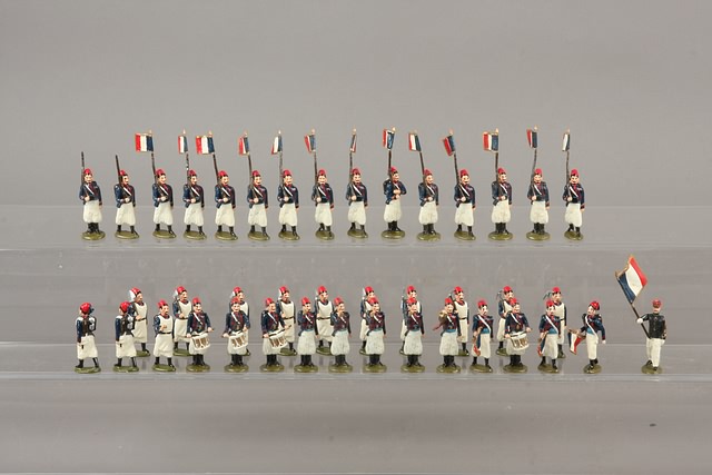 Appraisal: Lot of metal figures depicting French Turcos marching with musicians