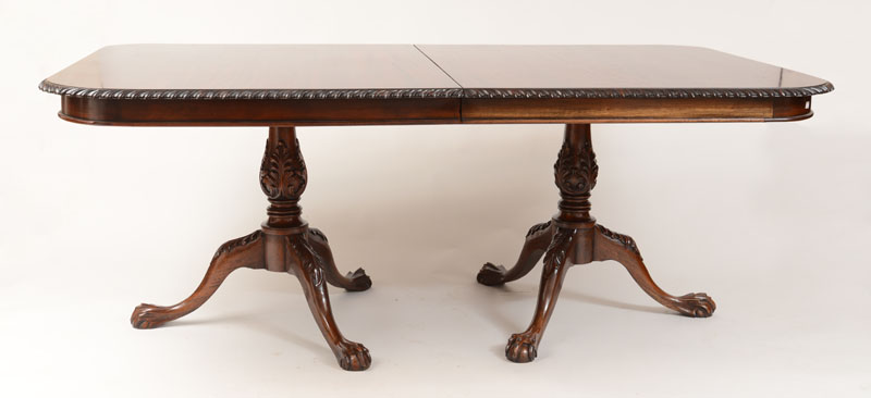 Appraisal: George III Style Carved Mahogany Two-Pedestal Dining Table and a