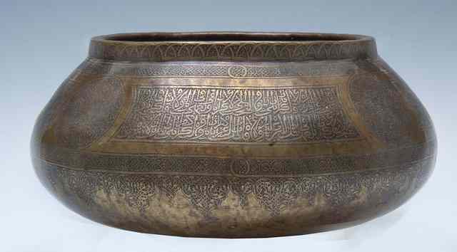 Appraisal: AN INDIAN MAMLUK ENGRAVED BRASS ROSE BOWL of oblate form