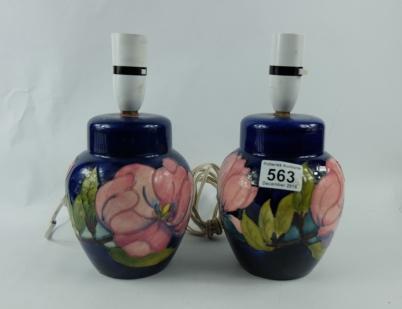 Appraisal: Moorcroft pair of Clematis on blue ground table lamps height