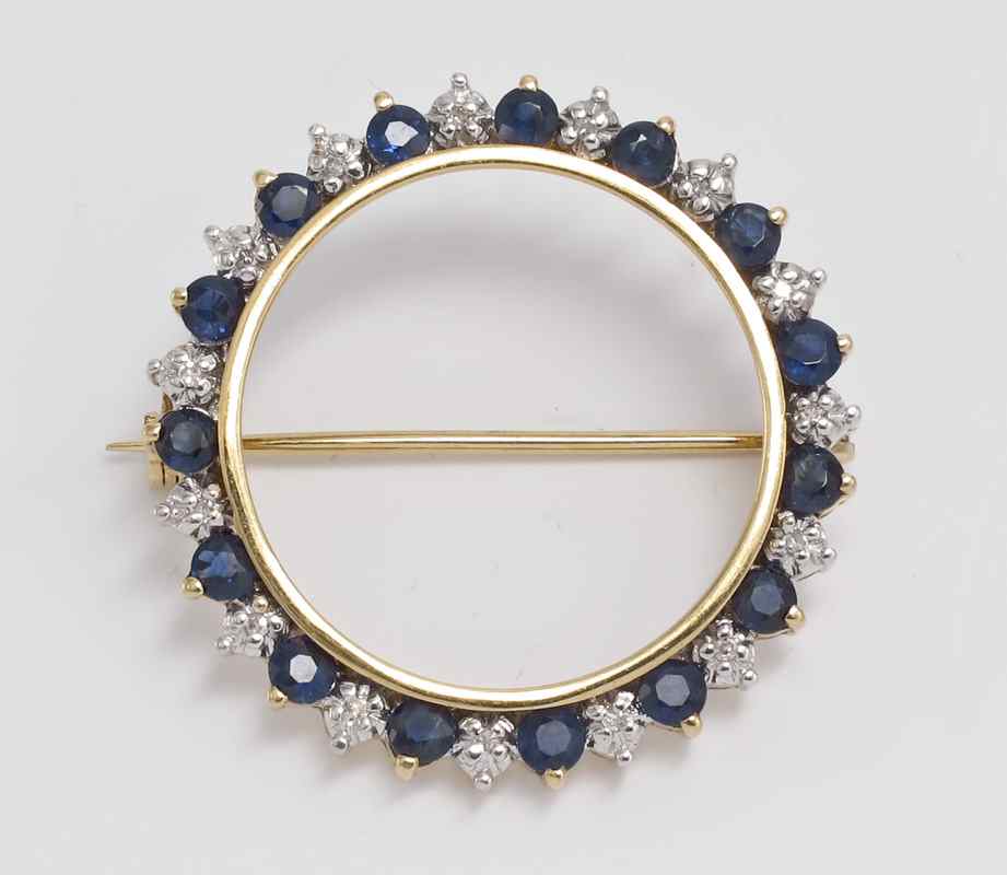 Appraisal: CLASSIC K DIAMOND SAPPHIRE CIRCLE BROOCH K yellow gold circle