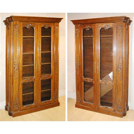 Appraisal: Pair of Provincial Louis VXI Style Wire Door Oak Cabinets