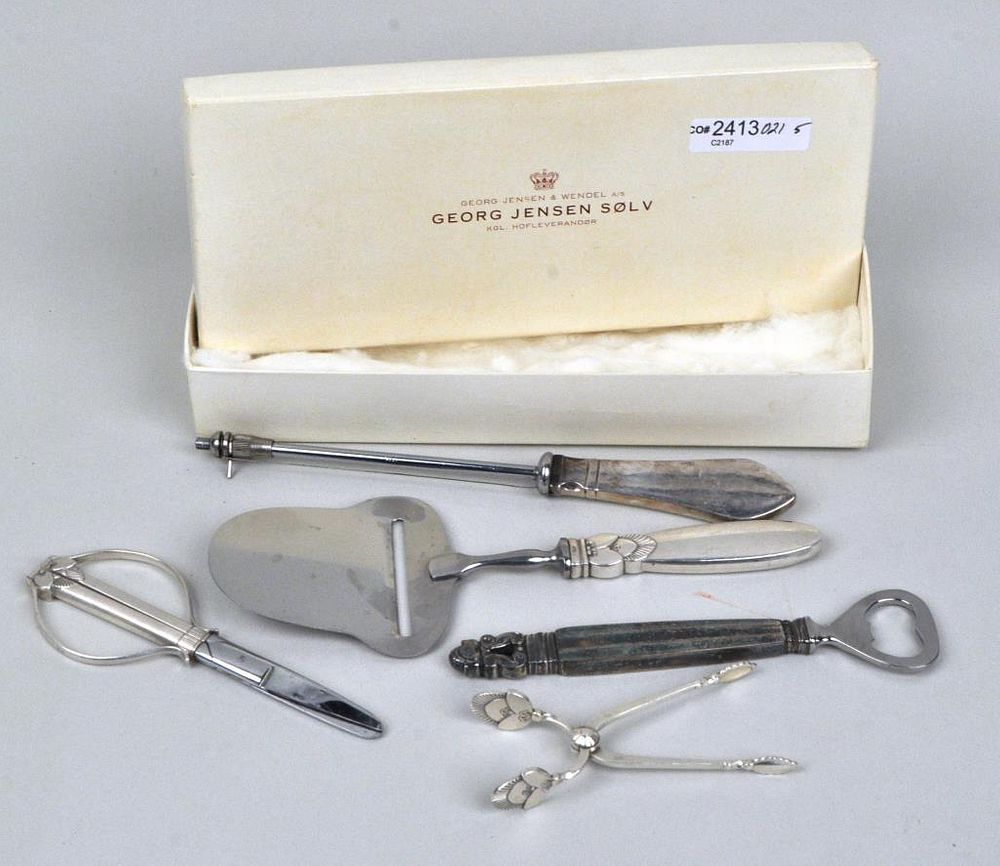 Appraisal: Group Five Georg Jensen Sterling Utensils comprising grape shears cheese