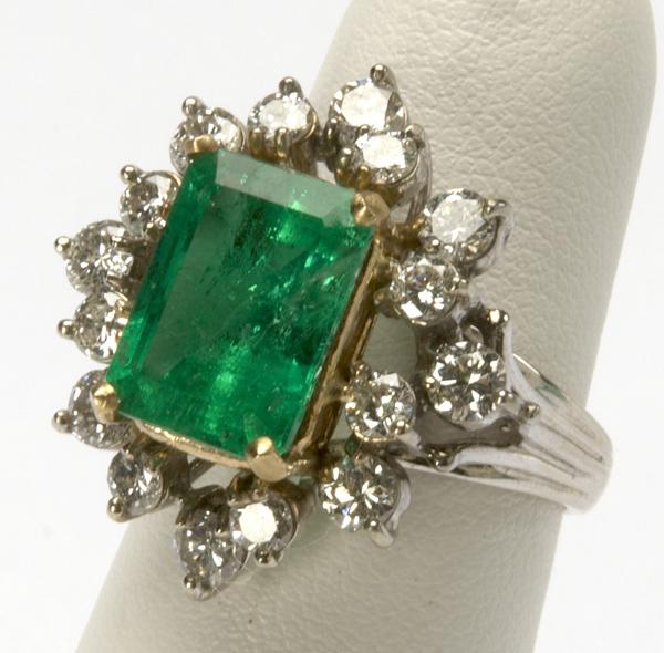 Appraisal: EMERALD DIAMOND RING k wg and yg ca Rectangular-cut emerald