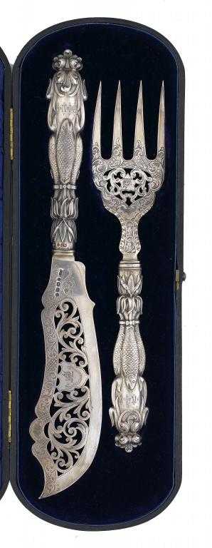 Appraisal: A PAIR OF VICTORIAN FISH SERVERS pierced and engraved with