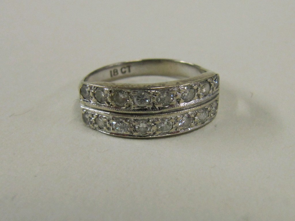 Appraisal: Eighteen carat white gold diamond half hoop ring