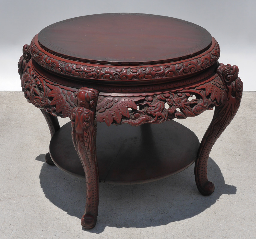 Appraisal: TH CENTURY CARVED JAPANESE RED LACQUER TABLE Round top with