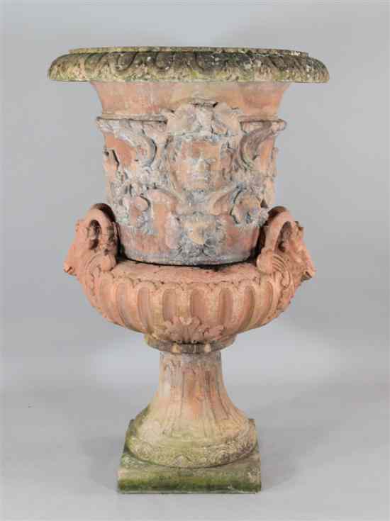 Appraisal: A late th century terracotta garden urn modelled with fruiting