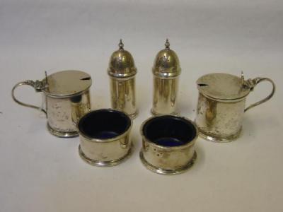 Appraisal: A SIX PIECE CONDIMENT SET of cylindrical form with moulded