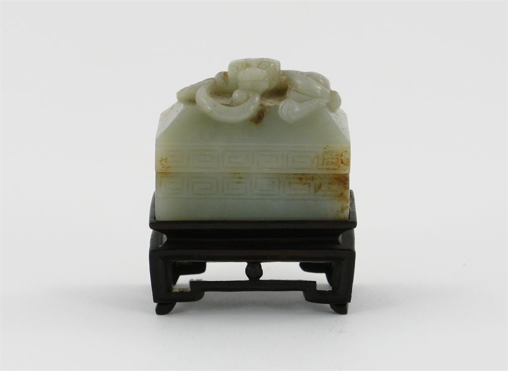 Appraisal: A Chinese celadon jade small rectangular box and cover