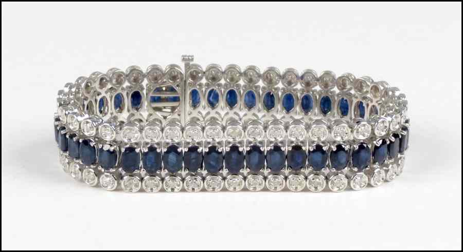 Appraisal: SAPPHIRE DIAMOND AND KARAT WHITE GOLD BRACELET round diamonds are