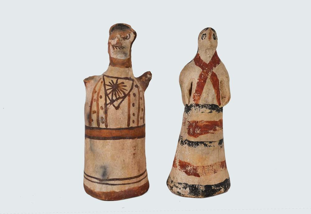 Appraisal: MINOAN CYPRIOT PAINTED POTTERY MALE FEMALEThe male figure Minoan circa