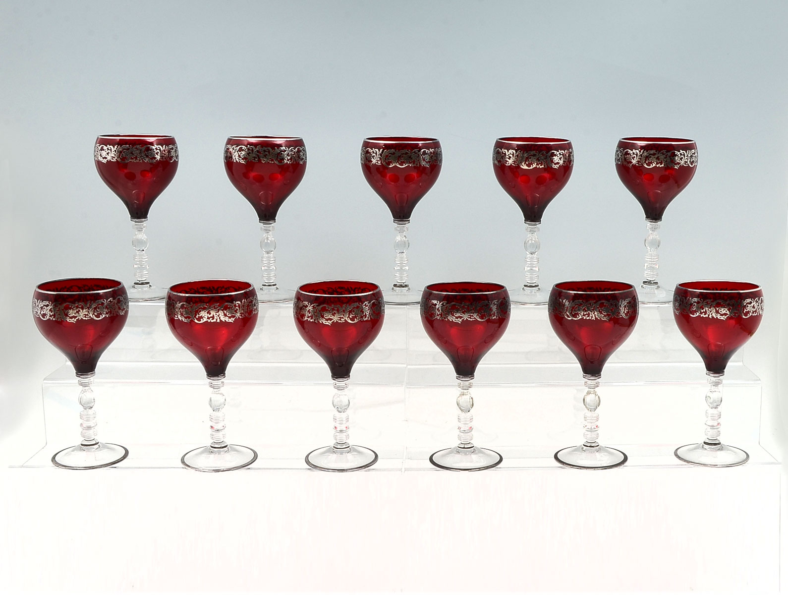 Appraisal: RED ROCKWELL WINE GLASSES WITH SILVER OVERLAY Red Rockwell wine