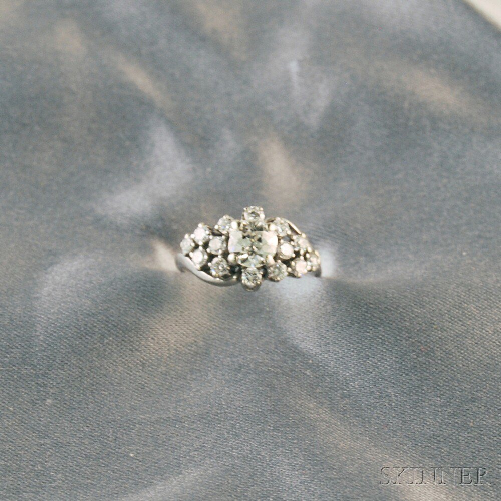 Appraisal: Platinum and Diamond Cluster Ring center stone approx cts chip