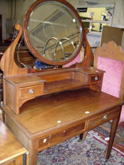 Appraisal: An Edwardian crossbanded mahogany dressing table with parquetry decoration