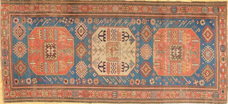 Appraisal: CAUCASIAN LIGHT BLUE-GROUND RUG Worked with two terracotta and central