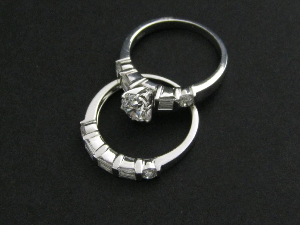 Appraisal: A Continental Diamond Ring claw-set principle brilliant-cut stone cts between