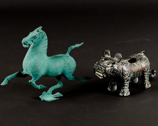 Appraisal: Two Cast Metal Ethnic Animal Figures one of a running