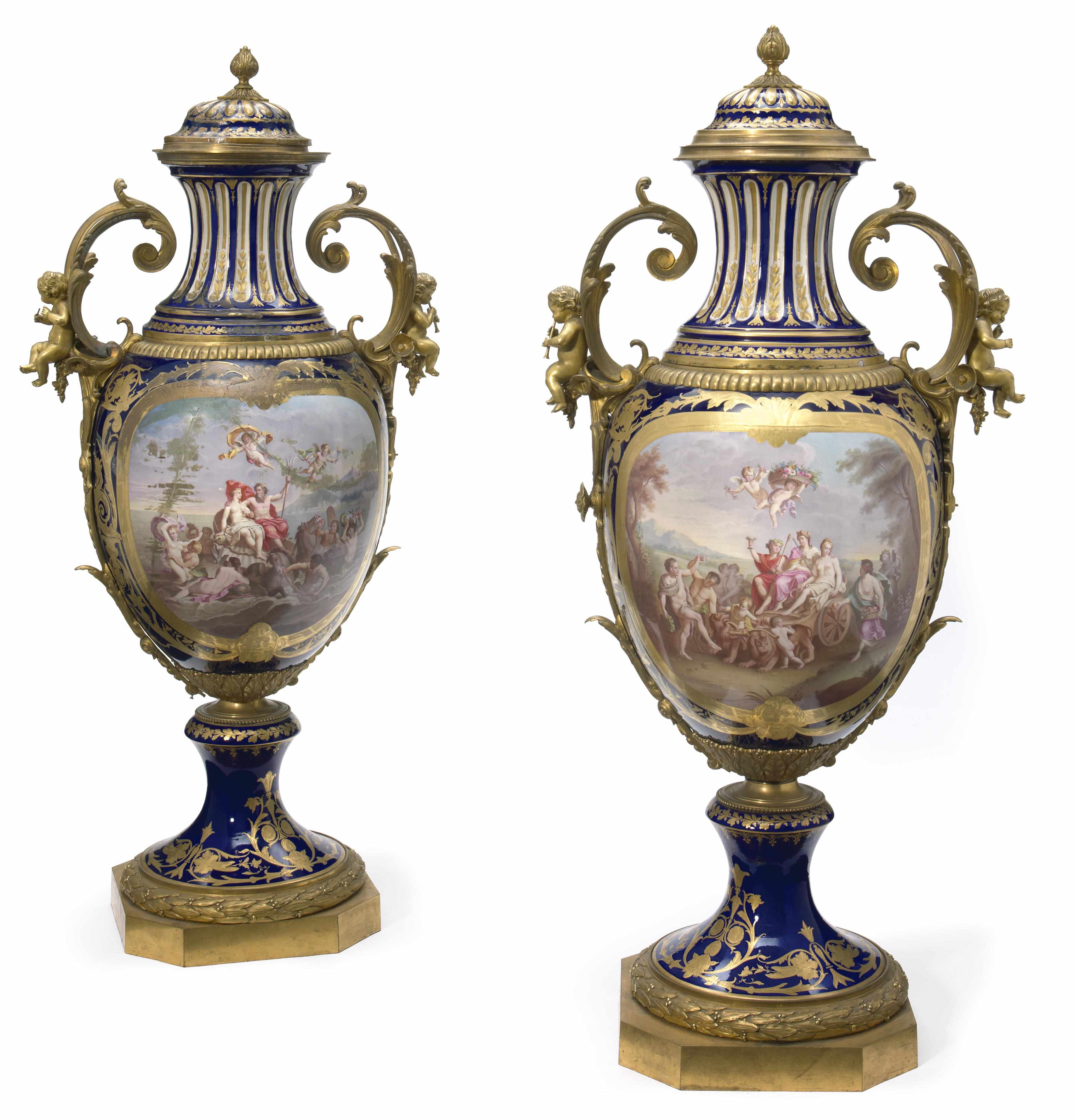 Appraisal: An imposing pair of Svres style gilt bronze mounted covered