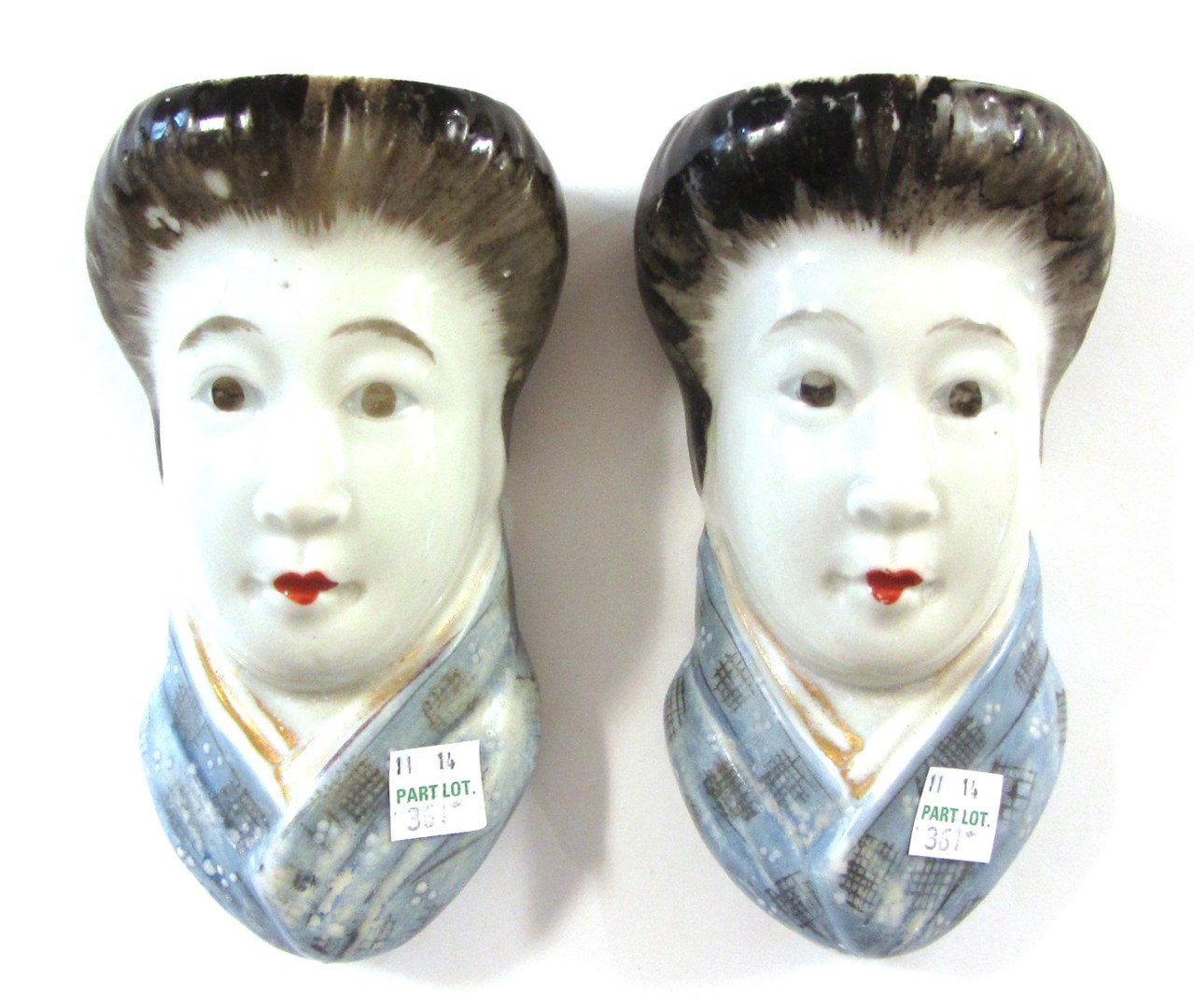 Appraisal: A pair of Chinese porcelain wall pockets th century each