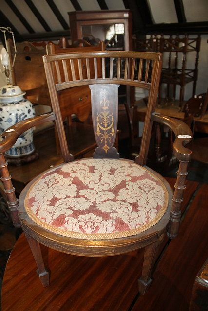 Appraisal: AN EDWARDIAN MAHOGANY AND SATINWOOD INLAID TUB ELBOW CHAIR