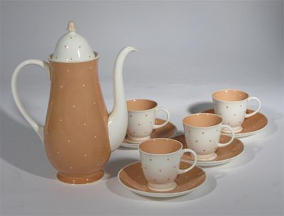 Appraisal: A Susie Cooper Polka dot part coffee service comprising coffee