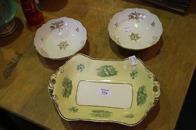 Appraisal: A PAIR OF FLIGHT WHITE GROUND DISHES each with gilt