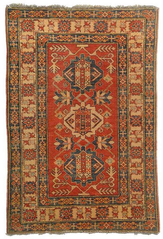 Appraisal: Small Persian Rug three central medallions on orange field yellow