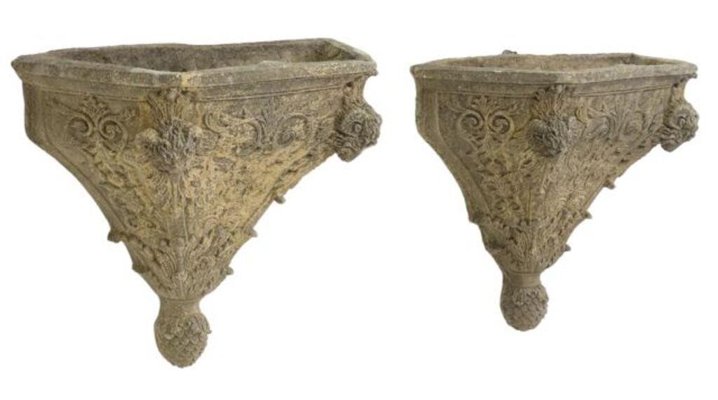 Appraisal: pair Cast stone wall-mounted planters late th c molded edge