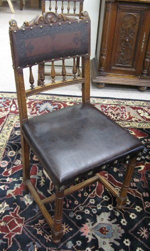 Appraisal: A SET OF SIX WALNUT AND BROWN LEATHERETTE DINING CHAIRS