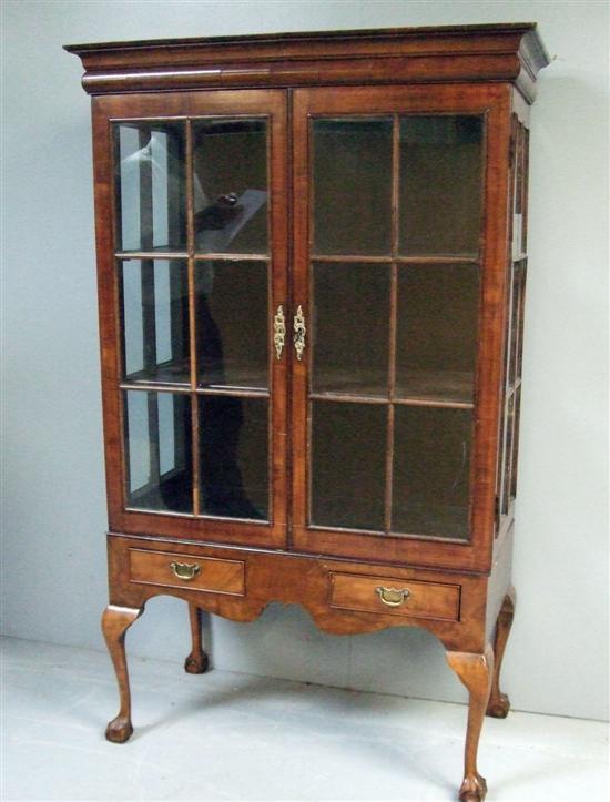 Appraisal: th century style walnut display cabinet raised on base with