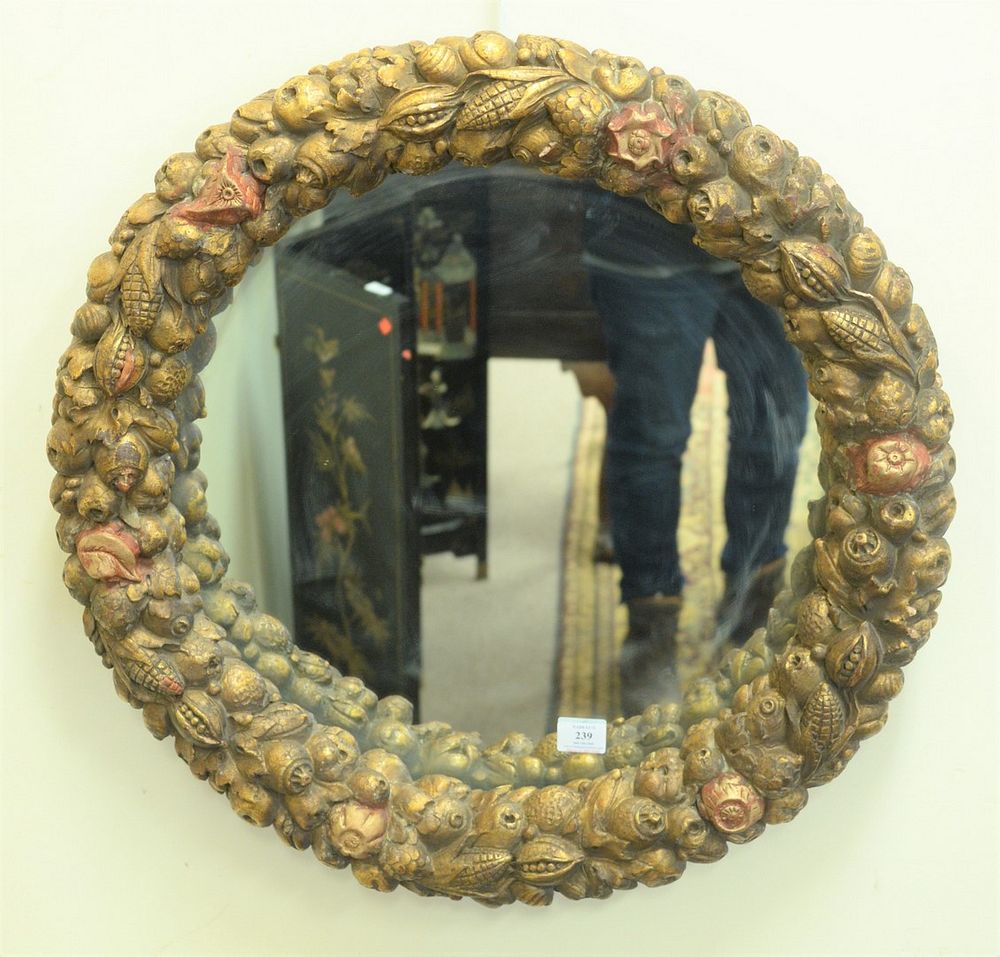 Appraisal: Round Gilt Mirror having vegetable and fruit carved frame diameter