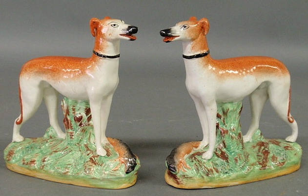 Appraisal: Pair of Staffordshire standing whippets marked Made in England h