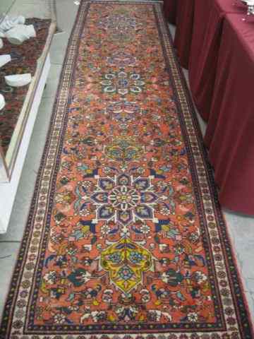 Appraisal: Heriz Persian Handmade Runner geometric floral designs salmon field '