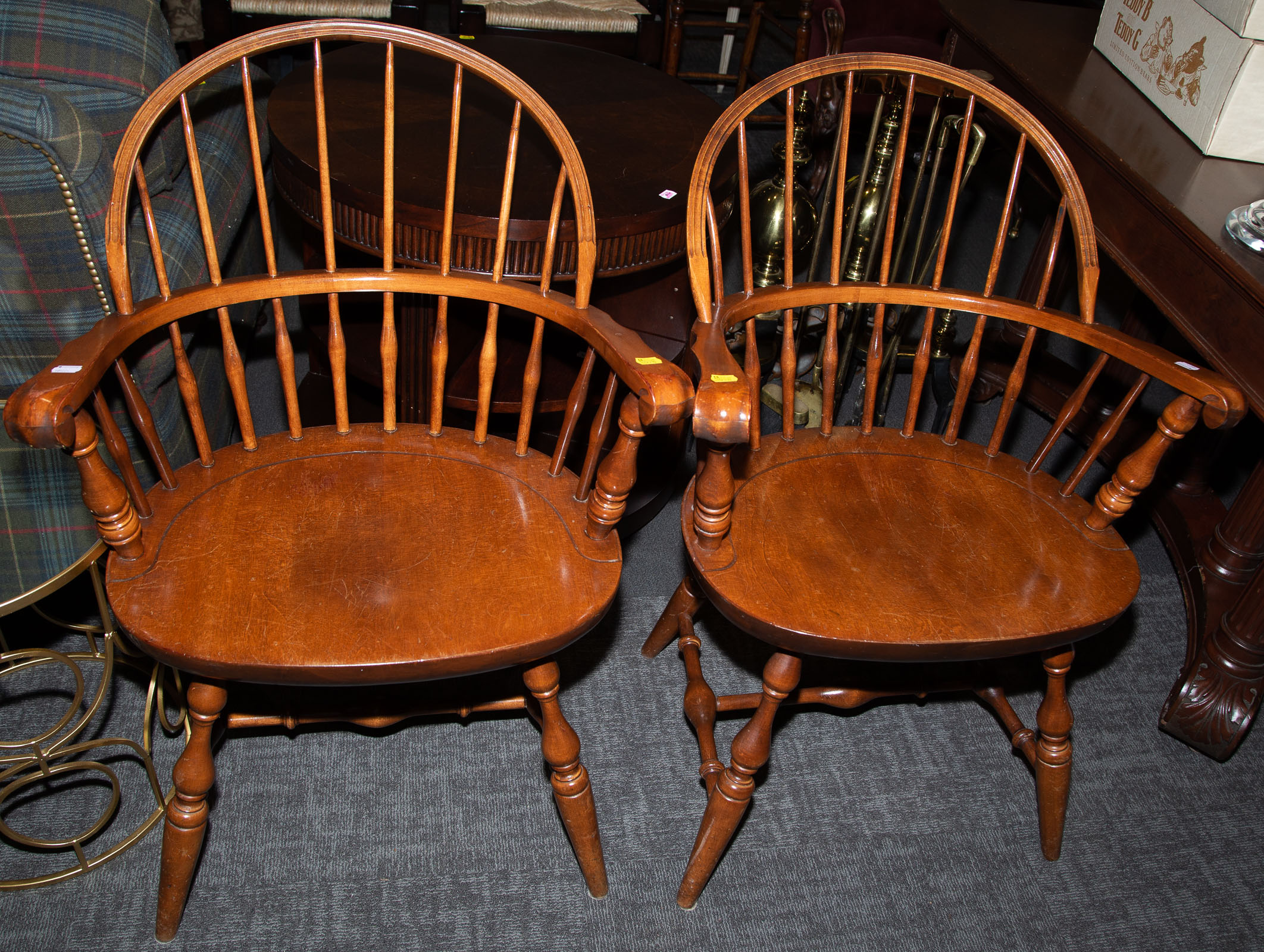 Appraisal: A PAIR OF WINDSOR COMB-BACK BIRCH ARM CHAIRS th century