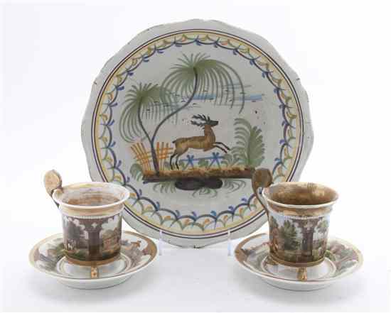 Appraisal: A Pair of Paris Porcelain Cups and Saucers each decorated