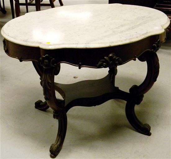 Appraisal: Victorian-style white marble top mahogany table serpentine skirt and scroll