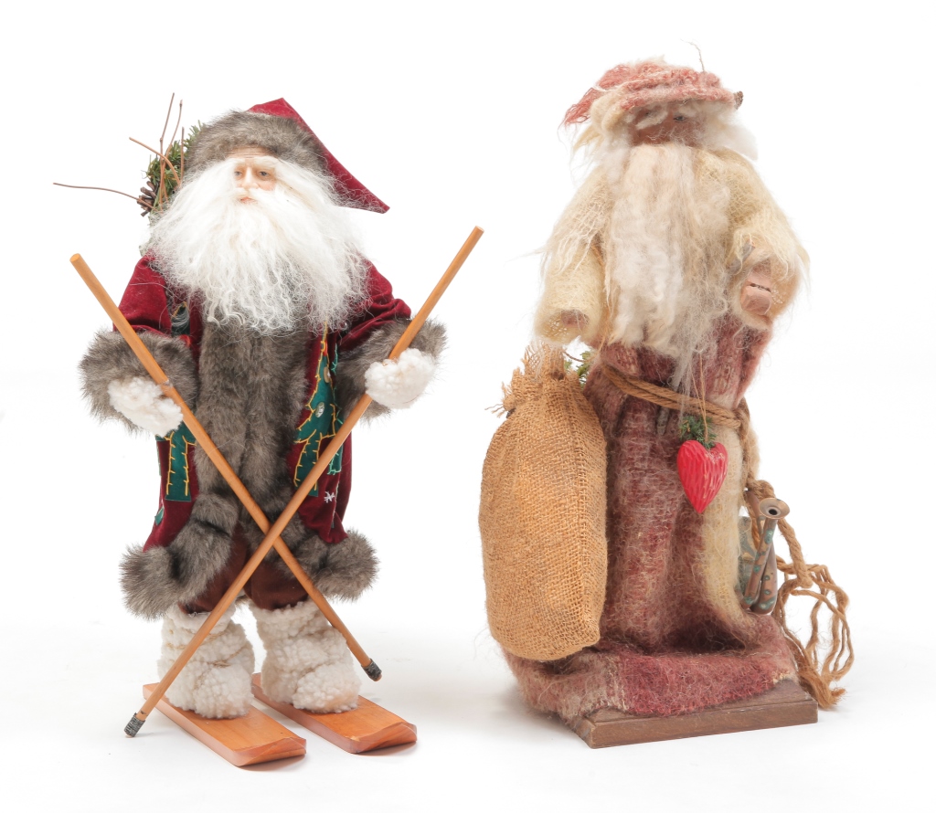 Appraisal: American th century Including a wooden Santa in red and