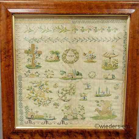 Appraisal: Silk on linen English sampler dated in a wreath of