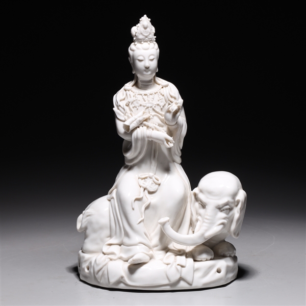 Appraisal: Chinese porcelain white glazed Guanyin statue seated on elephant overall