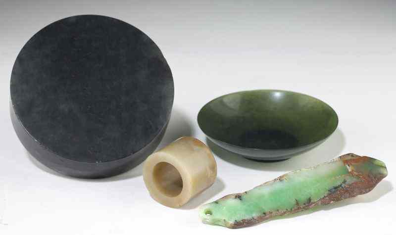 Appraisal: Four Chinese Jade Articlesto include lidded spinach jade circular inkstone